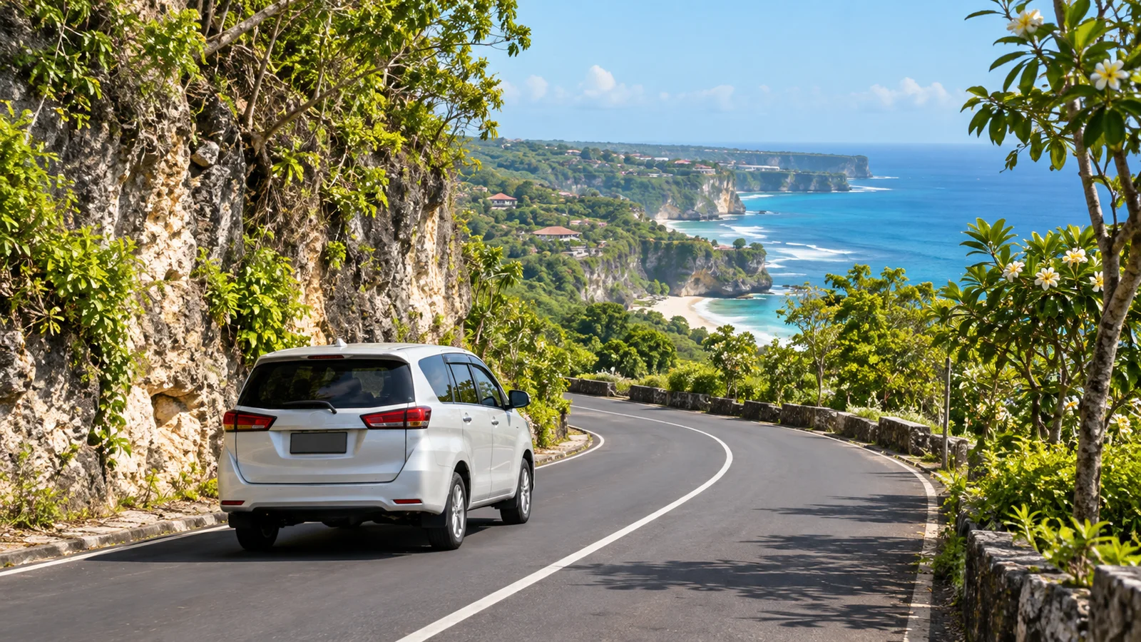 Private driver collecting travellers for a Bali airport to Uluwatu transfer